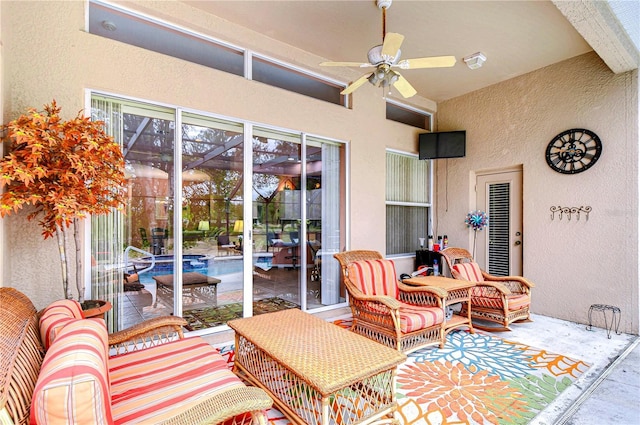 view of patio / terrace featuring ceiling fan and outdoor lounge area