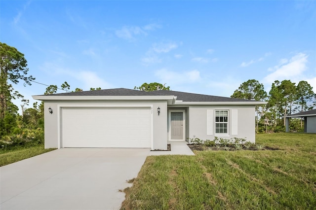 single story home featuring a garage and a front lawn