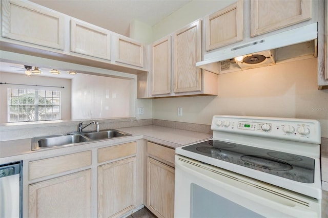 kitchen with electric stove, stainless steel dishwasher, light brown cabinetry, and sink