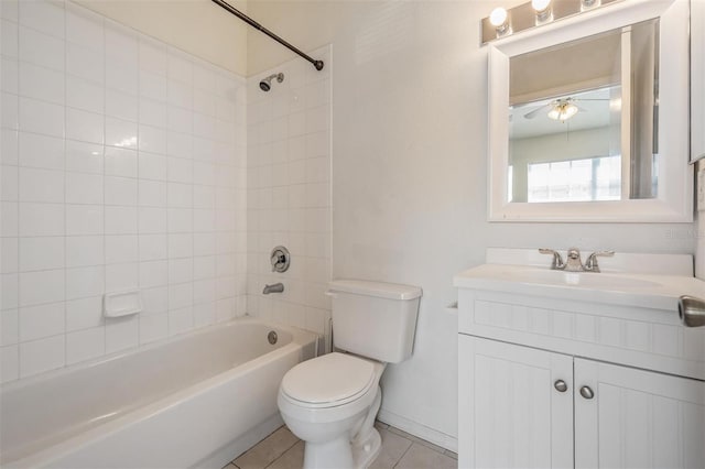 full bathroom with tile patterned floors, toilet, a ceiling fan, vanity, and tub / shower combination