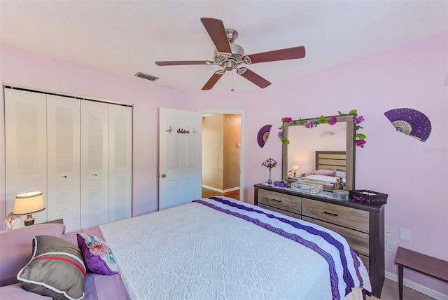 bedroom featuring a closet and ceiling fan