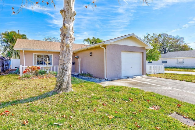 view of front of home with a garage, a front lawn, and a porch