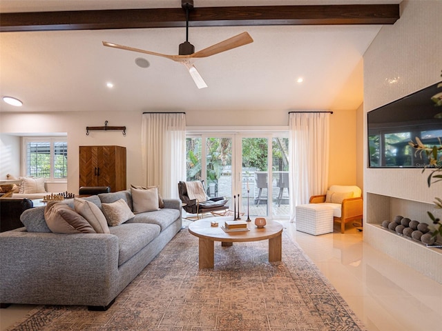 tiled living room featuring lofted ceiling with beams and ceiling fan