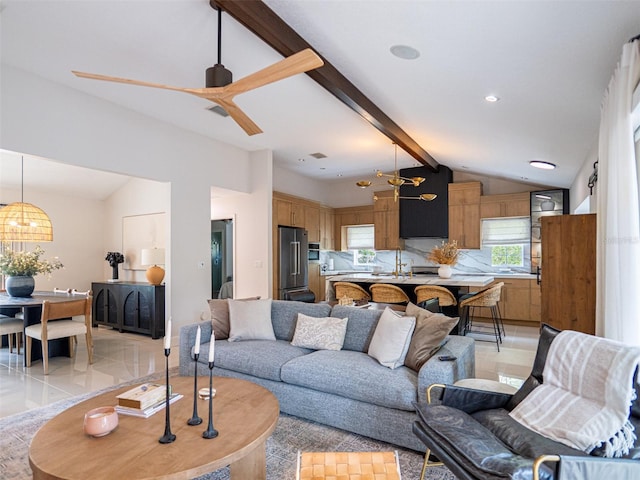 living room featuring vaulted ceiling with beams and ceiling fan