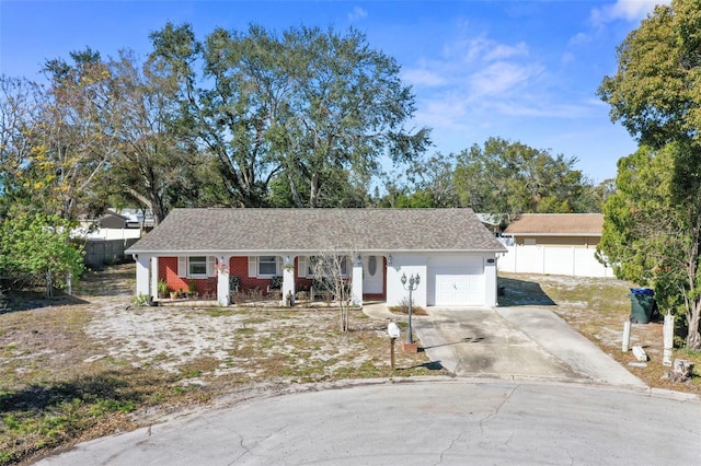 single story home featuring a garage