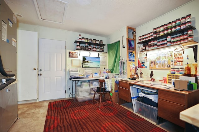 bar featuring concrete flooring and a workshop area