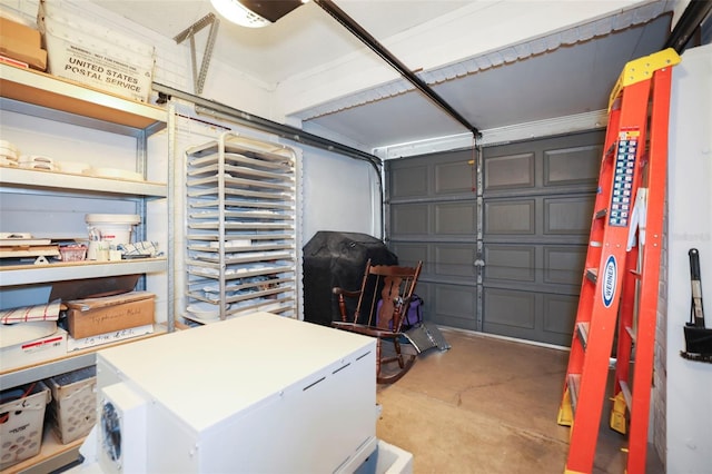 garage with a garage door opener and refrigerator