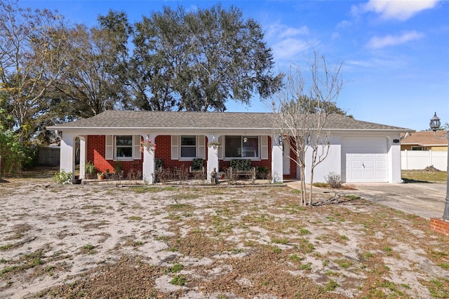 single story home with a garage