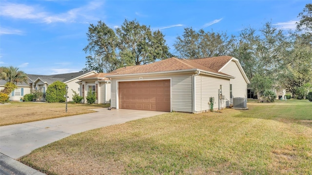 view of property exterior with a garage, central AC unit, concrete driveway, and a lawn