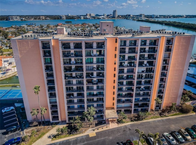 view of building exterior with a water view