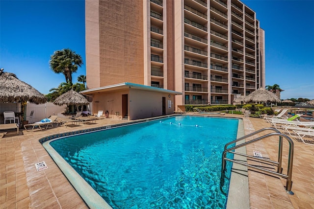 view of pool featuring a gazebo and a patio