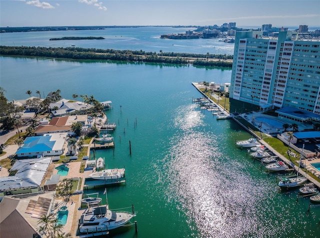 birds eye view of property featuring a water view