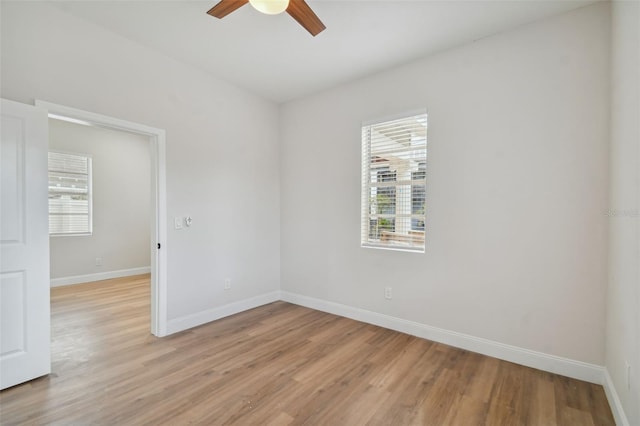 unfurnished room featuring ceiling fan and light hardwood / wood-style floors