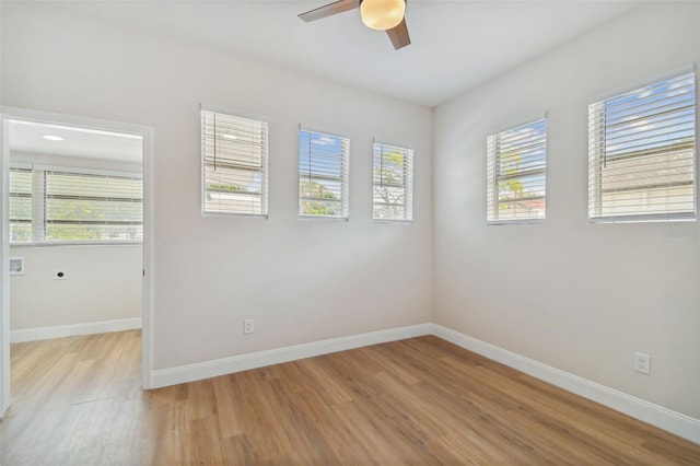 unfurnished room with light hardwood / wood-style floors and ceiling fan