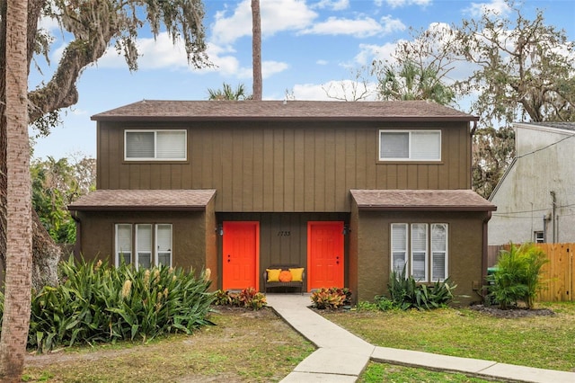 view of front of home with a front yard