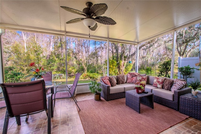 sunroom / solarium with ceiling fan