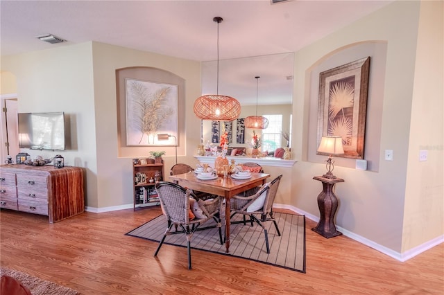 dining area featuring light hardwood / wood-style flooring