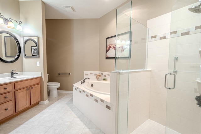 full bathroom with vanity, tile patterned floors, toilet, and separate shower and tub