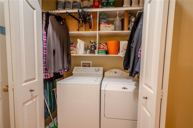 washroom with independent washer and dryer