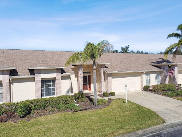 single story home with a garage and a front yard