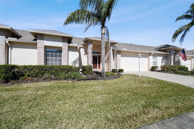 ranch-style home with a garage and a front lawn