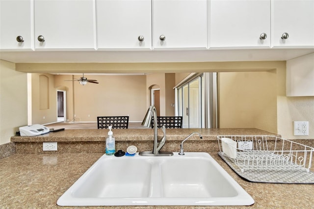 kitchen featuring sink and ceiling fan