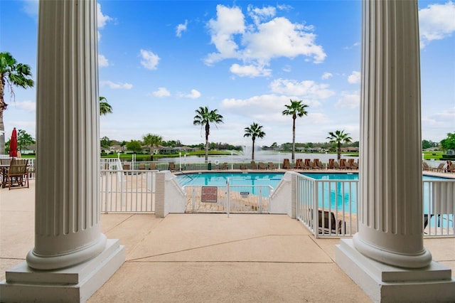 view of swimming pool with a patio