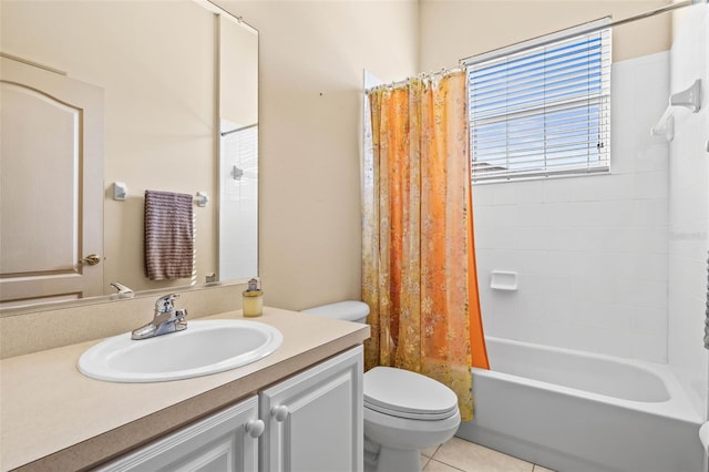 bathroom featuring toilet, shower / bathtub combination with curtain, vanity, and tile patterned floors