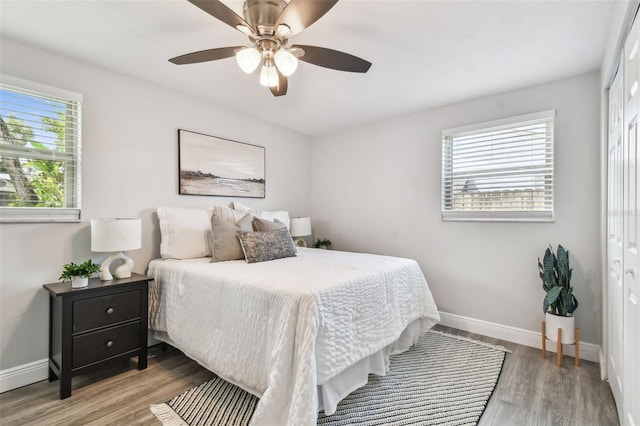 bedroom featuring ceiling fan and wood-type flooring