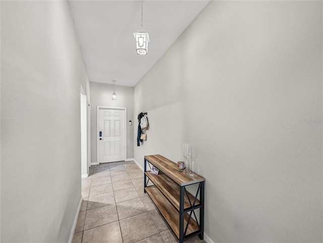 entryway featuring light tile patterned flooring