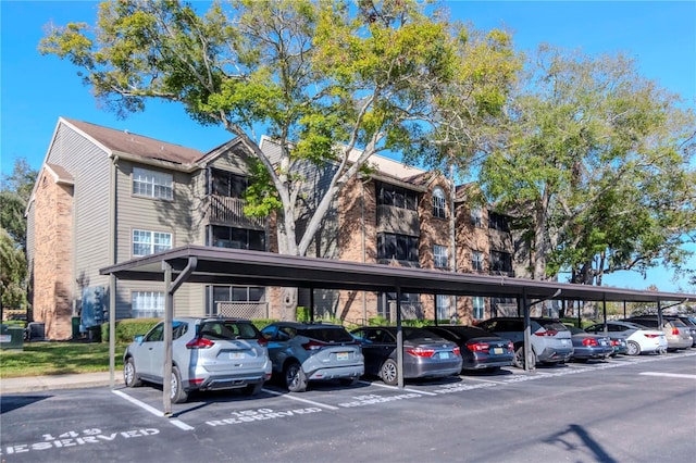 view of parking featuring a carport