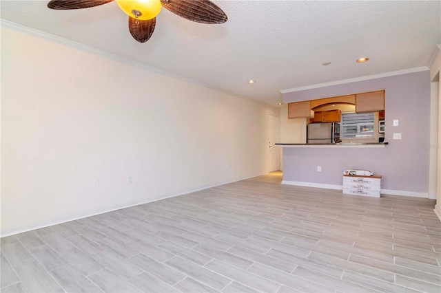 unfurnished living room featuring ceiling fan, ornamental molding, light hardwood / wood-style floors, and a textured ceiling