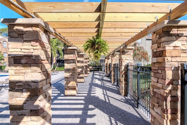 view of patio featuring a pergola