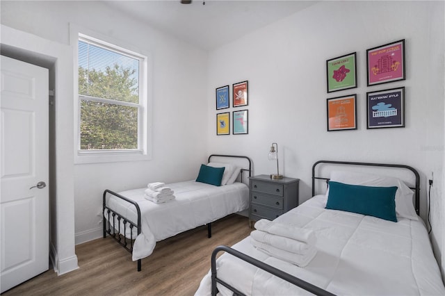 bedroom with wood-type flooring