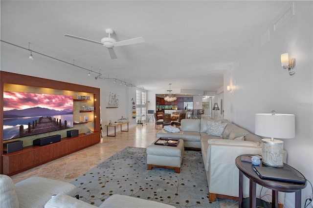 living room with ceiling fan