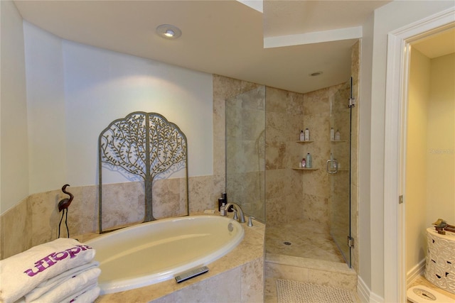 bathroom featuring plus walk in shower