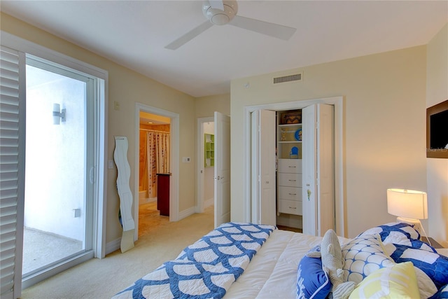 bedroom with light carpet, access to exterior, ceiling fan, and a closet