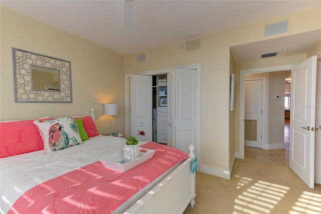 carpeted bedroom with a closet