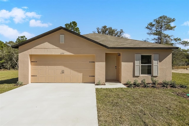 single story home featuring a garage and a front yard