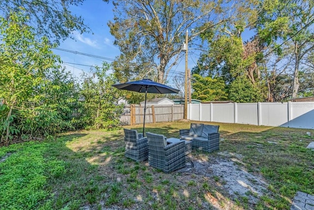 view of yard with an outdoor living space