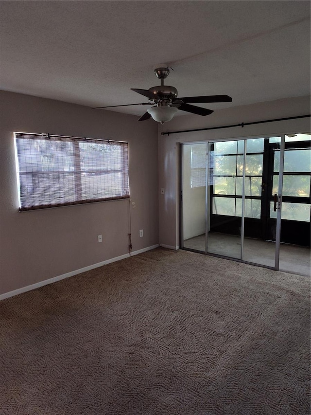 unfurnished bedroom featuring carpet floors and a textured ceiling