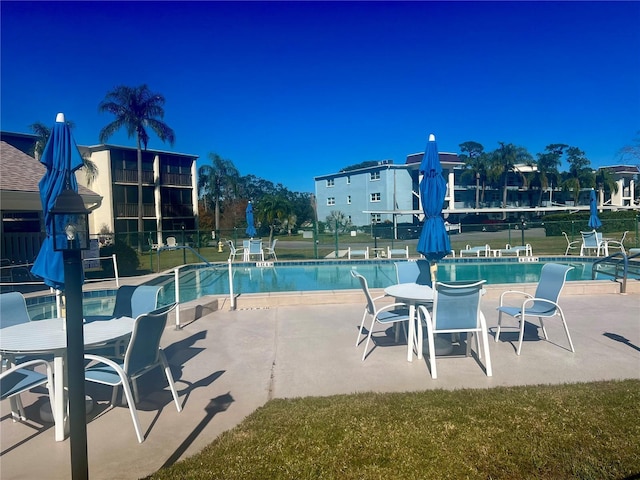 view of pool with a patio area