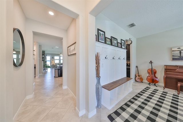 mudroom featuring light tile patterned flooring