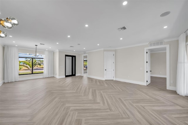 unfurnished living room with an inviting chandelier, crown molding, and light parquet flooring