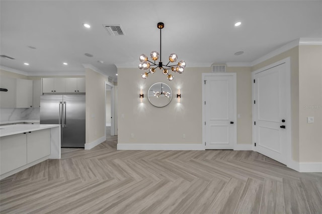 unfurnished dining area with ornamental molding, visible vents, and baseboards