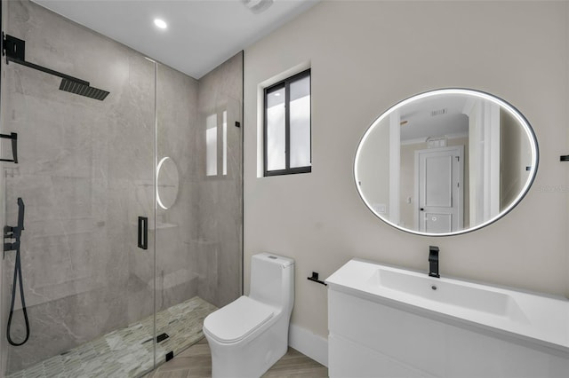 bathroom featuring toilet, recessed lighting, vanity, baseboards, and a shower stall