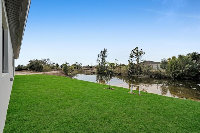 view of yard with a water view