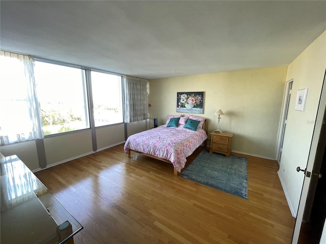 bedroom featuring hardwood / wood-style flooring