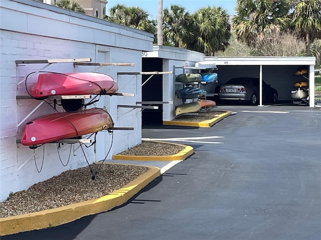 view of car parking featuring a carport