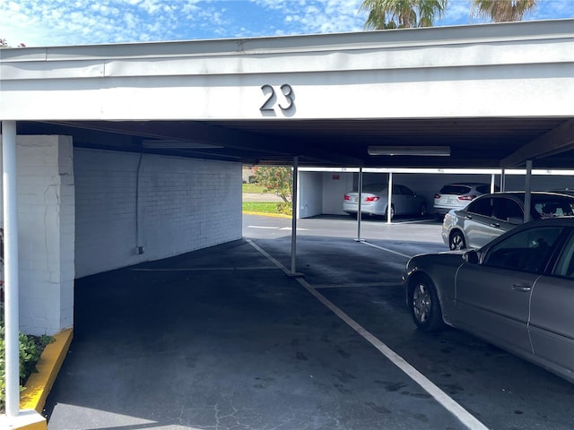 exterior space with a carport